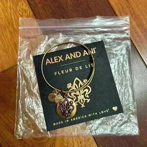 Alex and Ani | Brand new fleur de  lis bronze bracelet